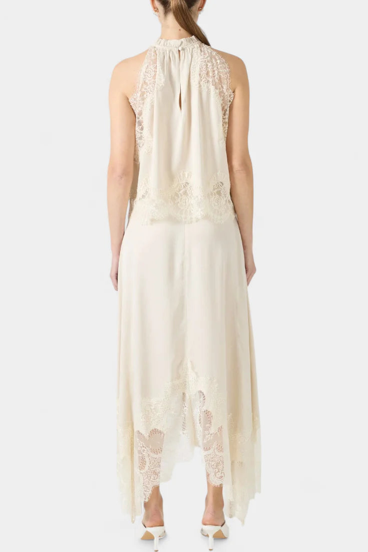 Conjunto Coralena · Elegancia en encaje con falda asimétrica