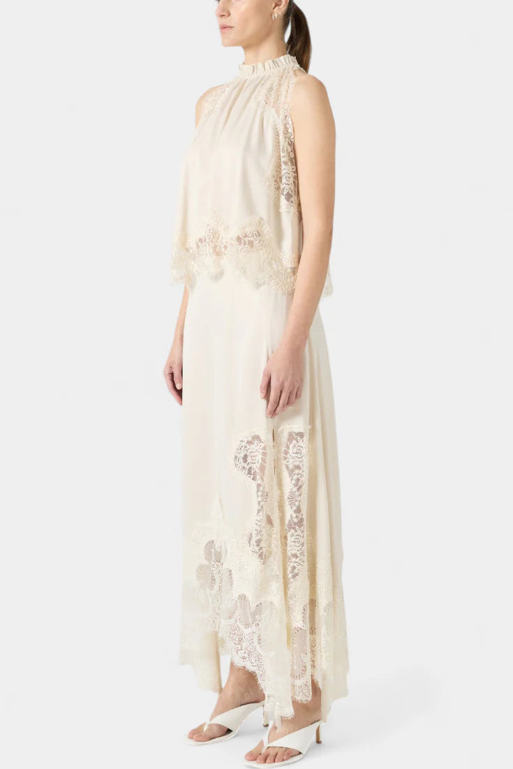 Conjunto Coralena · Elegancia en encaje con falda asimétrica