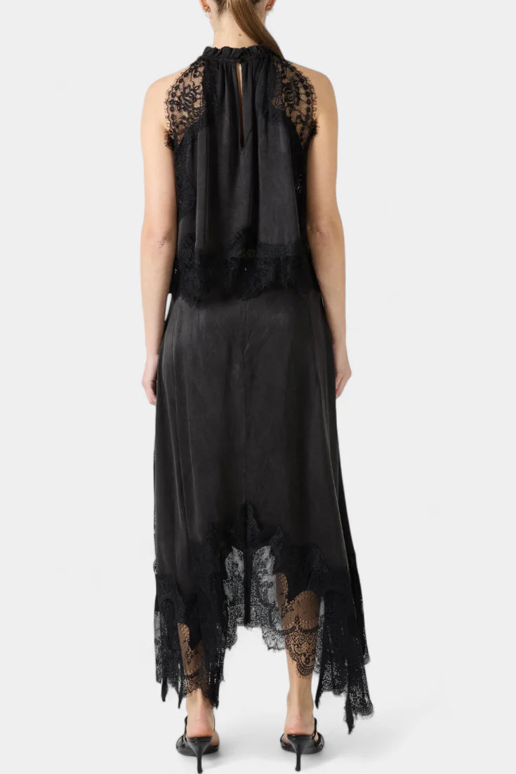 Conjunto Coralena · Elegancia en encaje con falda asimétrica